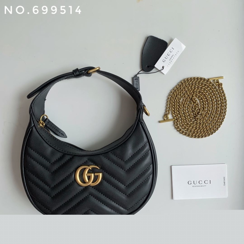 G*u*i top handle bags